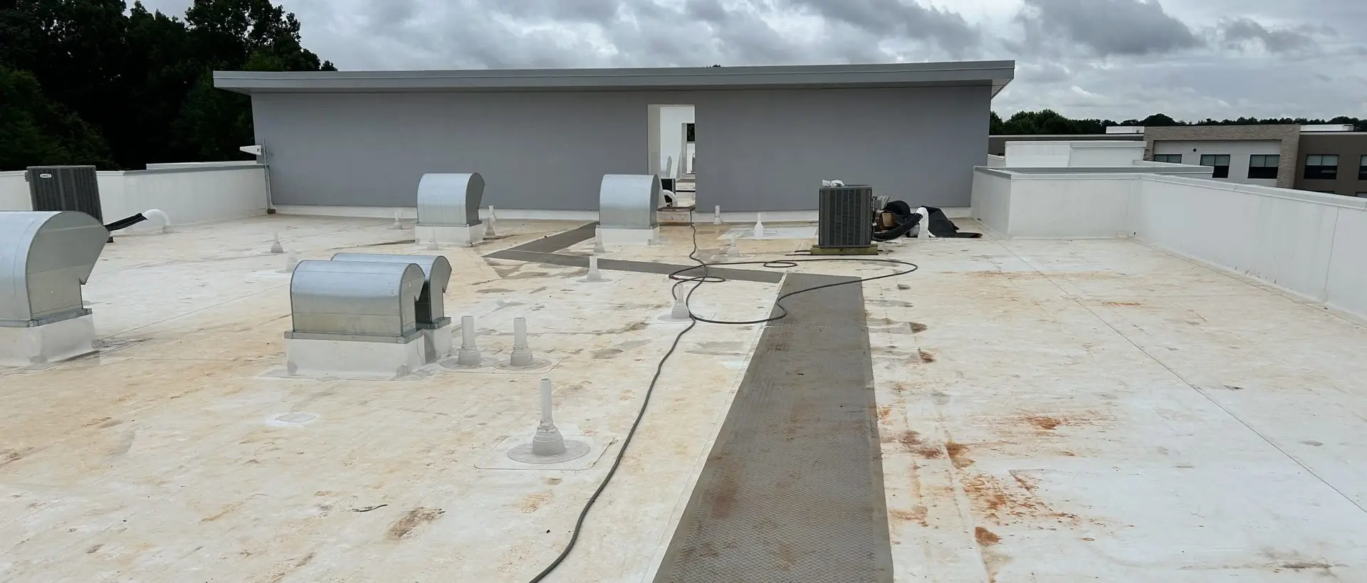 TPO roofing membrane with discoloration before cleaning